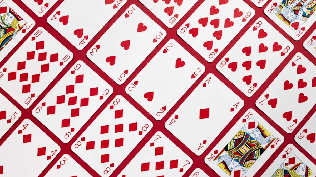 A close up of a red and white table cloth